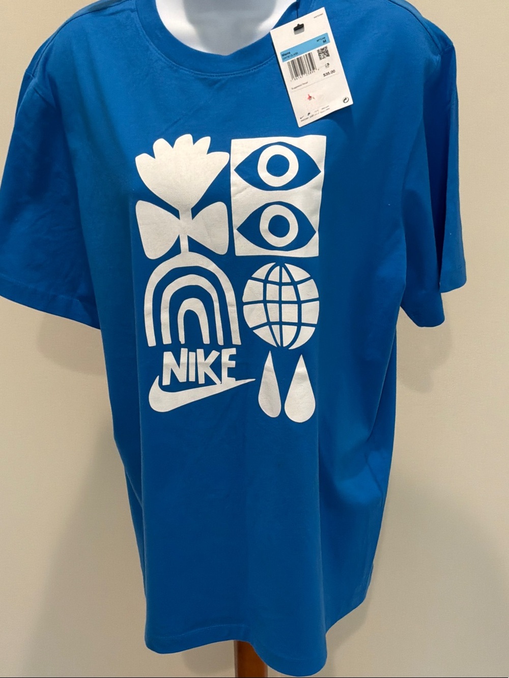 Nike Bright Blue Graphic Logo Tee with White Icons unisex size m